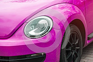 Pink car with round headlights detail style tyre