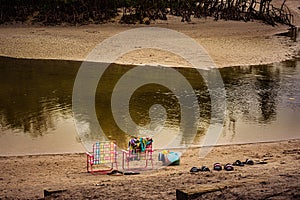 Pink Chairs, Colorful Towels & Beach Toys