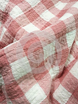 Pink checkered cotton blanket