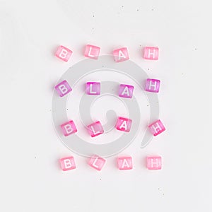 Pink CHILL OUT beads word typography