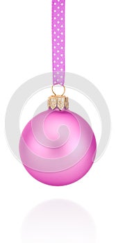 Pink Christmas ball hanging on ribbon Isolated on white background