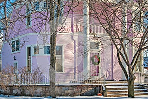 Pink Christmas house in winter