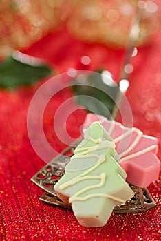 Pink christmas tree homemade sweets in festive golden red style