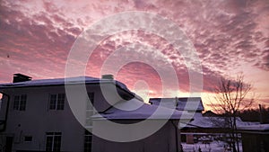 pink clouds and big neighborly house