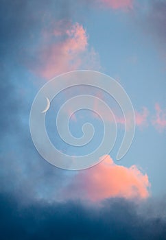 Pink clouds and moon heaven closeup