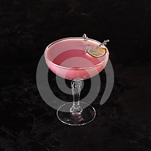 Pink cocktail with vodka, almond milk, grenadine and cream.