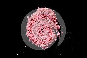 Pink color dust particles splattered on black background