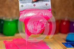 pink color dripping from hand screen printing