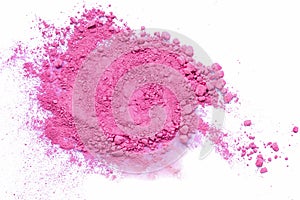 Pink color dust particles splattered on white background.