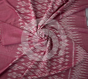 Pink color hand woven cotton fabric in Thai ancient style pattern