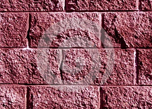 Pink color stylized brick wall pattern.