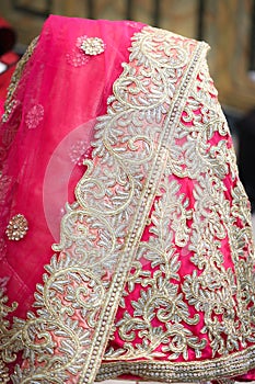 Pink colored lehenga with embroidery work