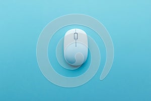 Pink computer mouse on pink gradient background