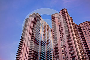 Pink condo with blue sky