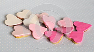 Pink cookies, heart shape, gray background