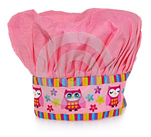 Pink cooking hat, with multi-colored pattern, hearts, flowers and owls. The pattern on the cap in the colors yellow, orange, red,