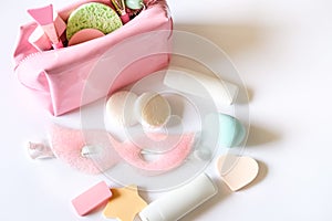 Pink cosmetic bag and beauty products