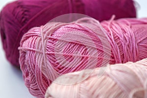 Pink cotton knitting yarn in clews