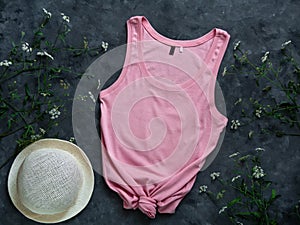 Pink cotton tank top mockup on dark background Blank plain t-shirt template for creative design Female summer sunglasses