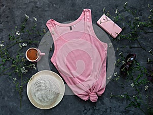 Pink cotton tank top mockup on dark background Blank plain t-shirt template for creative design Female summer sunglasses