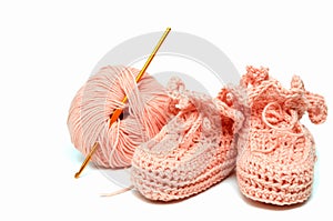 Pink crocheted babby's bootees