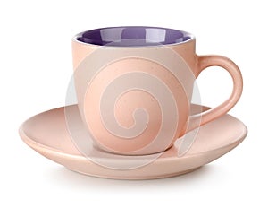 Pink cup and saucer isolated