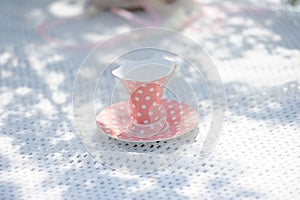 pink cup on the table