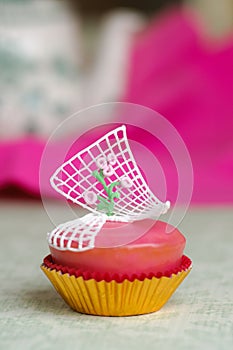 Pink cupcake with roses