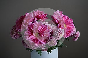 Pink dahlias with yellow centre and chrysanthemum flowers