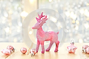 Pink deer and christmas decorations