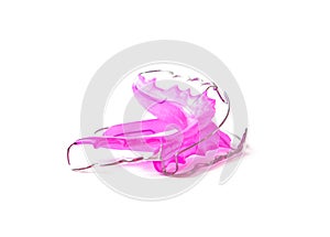 Pink dental retainer orthodontia, isolated on white background