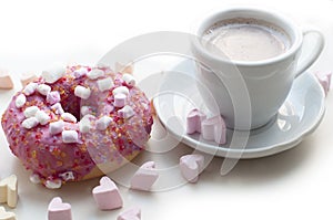 Pink donut with cocoa and murshmellow on white background