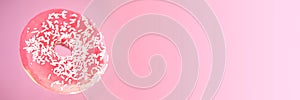 Pink donut on the pink background