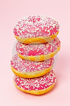 Pink donuts on pink background