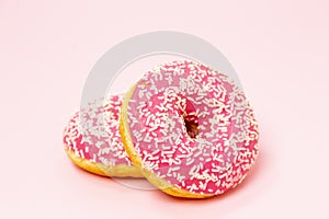 Pink donuts on pink background