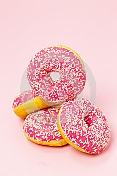 Pink donuts on pink background