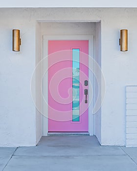 Pink door on a mid-century modern house