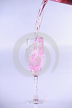 Pink drink bring poured