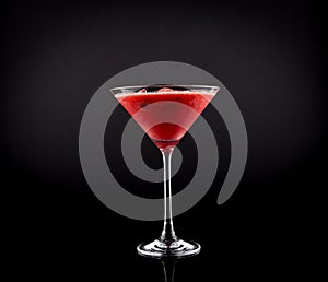 Pink Drink in Martini Glass, Slush Ice summer drink, isolated on black