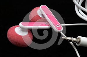 Pink Earbuds Closeup, macro, on black