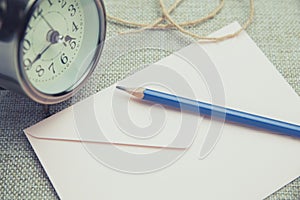 Pink envelope document, Blue pencil