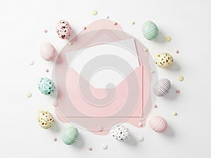 Pink envelope with easter eggs isolated on white background