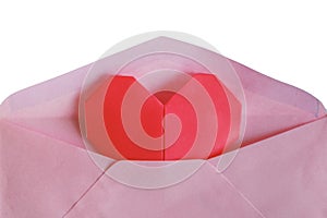 Pink envelope with red heart paper origami isolated on white background