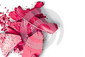 Pink eye shadow powder as makeup palette closeup isolated on white background, crushed cosmetics and beauty texture