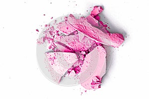 Pink eye shadow powder as makeup palette closeup isolated on white background, crushed cosmetics and beauty texture