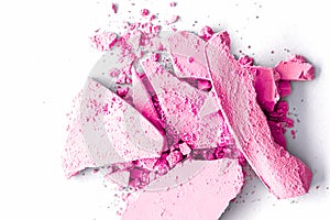 Pink eye shadow powder as makeup palette closeup isolated on white background, crushed cosmetics and beauty texture