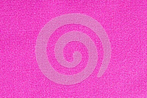 Pink fabric background texture. Detail of textile material close-up