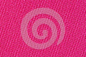 Pink fabric background texture. Detail of textile material close-up