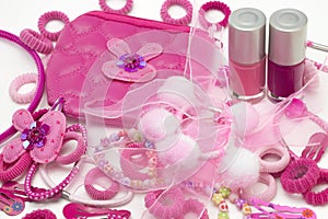 Pink fashion girly hair and nail accessories: clips, band and ribbons, pins and bow. Teenager hair clippers and grips. Little girl