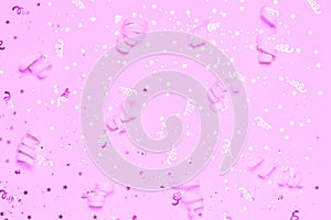 Pink festive confetti background.